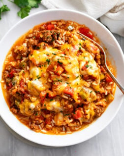 Unstuffed Peppers in a white bowl with a fork on the side.